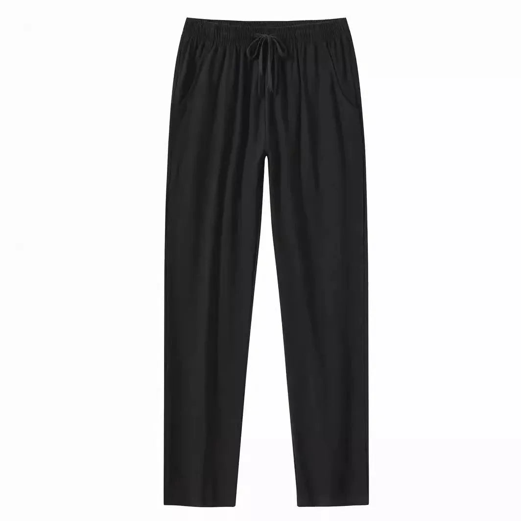 Men's loose-fit cotton beach trousers in solid white, sky blue, khaki, or black colours.