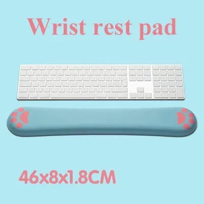 Cat's Claw cartoon design memory foam keyboard wrist rest pad in blue, shown on a desk.