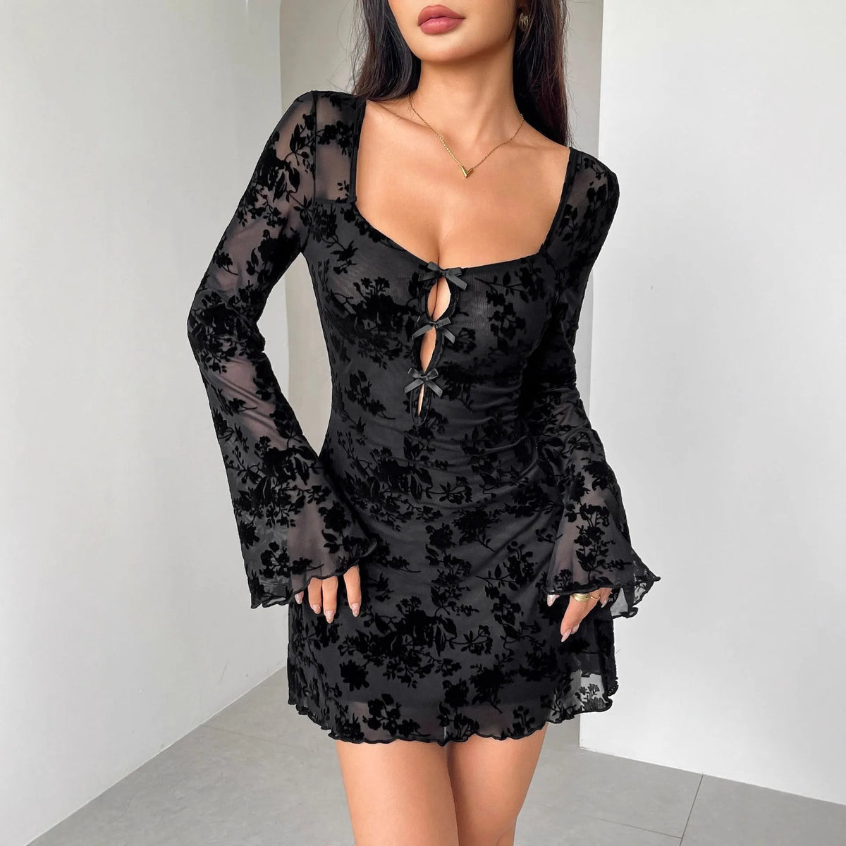 Women's flocking long sleeve floral hollow bow dress in black, square collar, bell sleeves, high-waist short hip skirt
