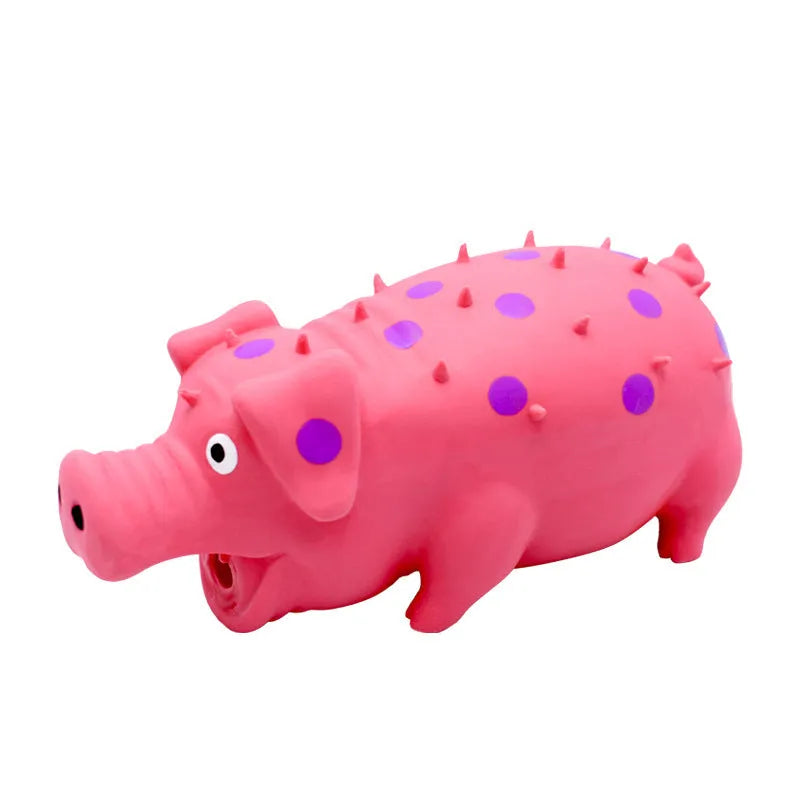 Pig-shaped latex dog chew toy with textured surface and squeaker in various colours