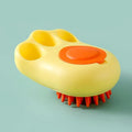 Blue pet bath and massage brush with silicone bristles and an ergonomic non-slip handle.