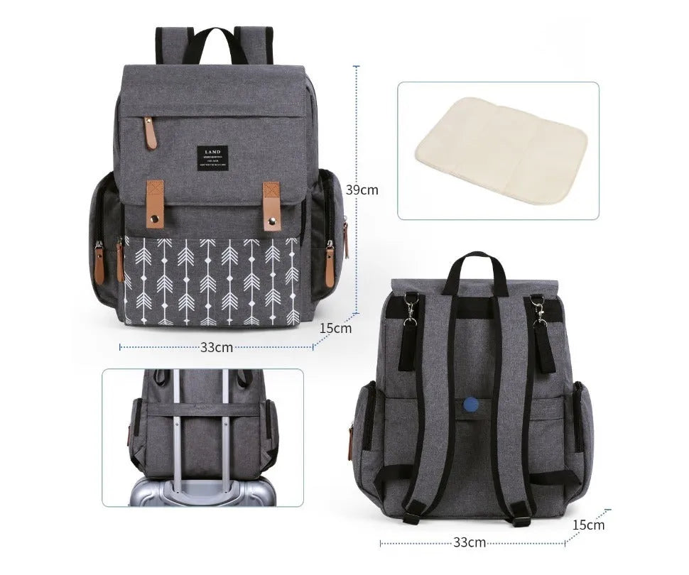 Land Mommy large oxford cloth diaper backpack in grey with a changing mat, shown open.