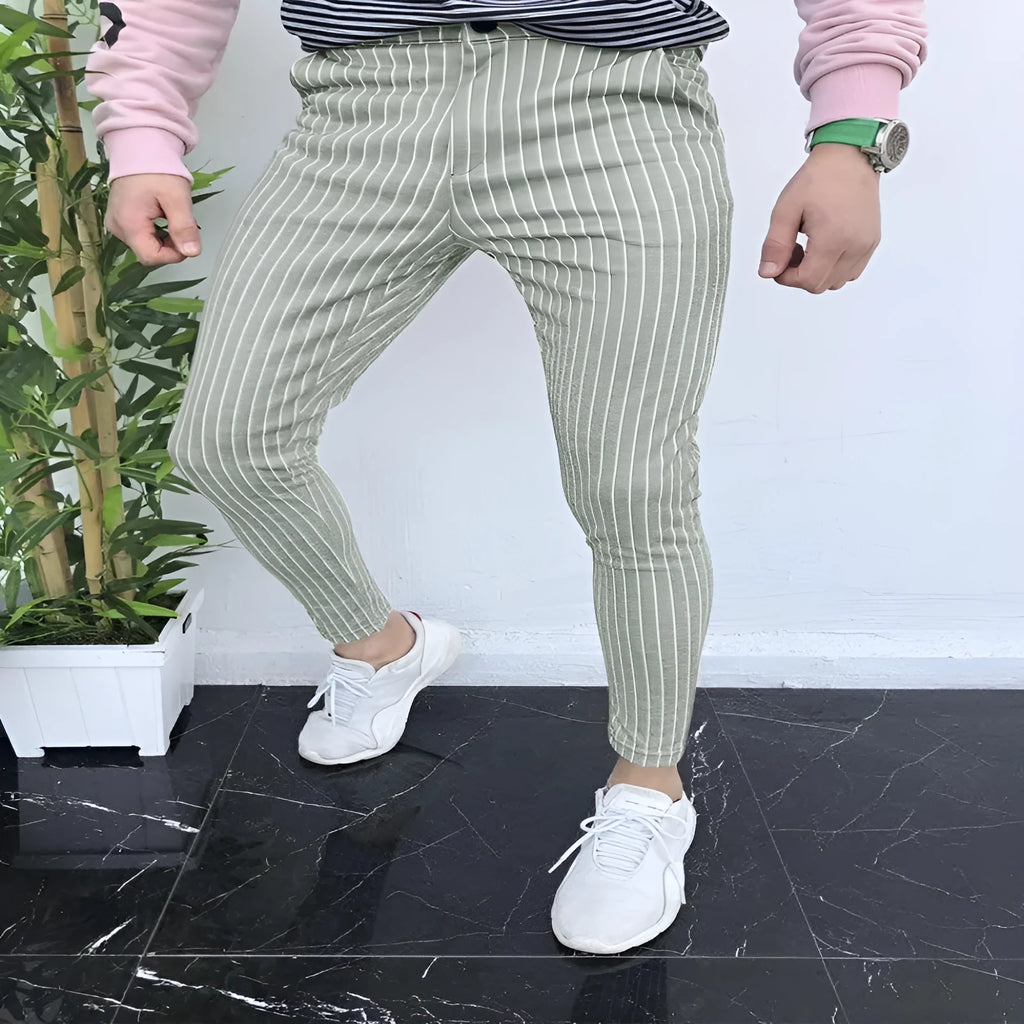 Men's slim-fit straight-leg trousers with a grey and black 3D printed plaid pattern.