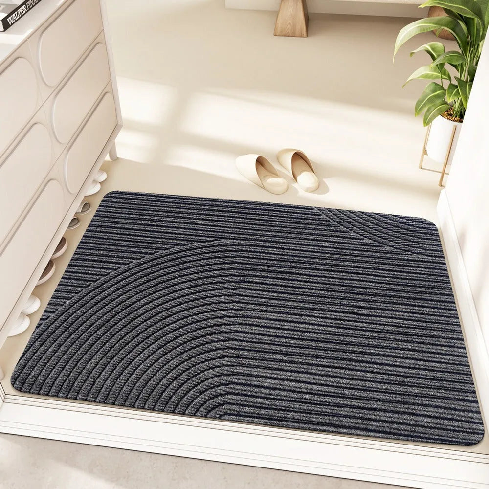 Green alien-shaped diatom oil entrance floor mat with cartoon anime pattern, measuring 60 by 90 cm.