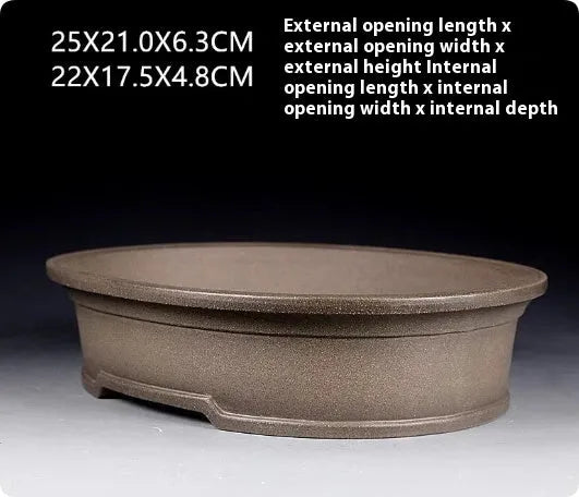 Handmade purple sand ceramic oval bonsai pot measuring 25cm by 21cm
