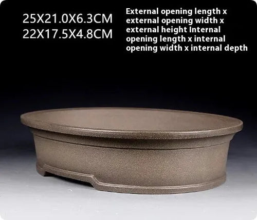 Handmade purple sand ceramic oval bonsai pot measuring 25cm by 21cm