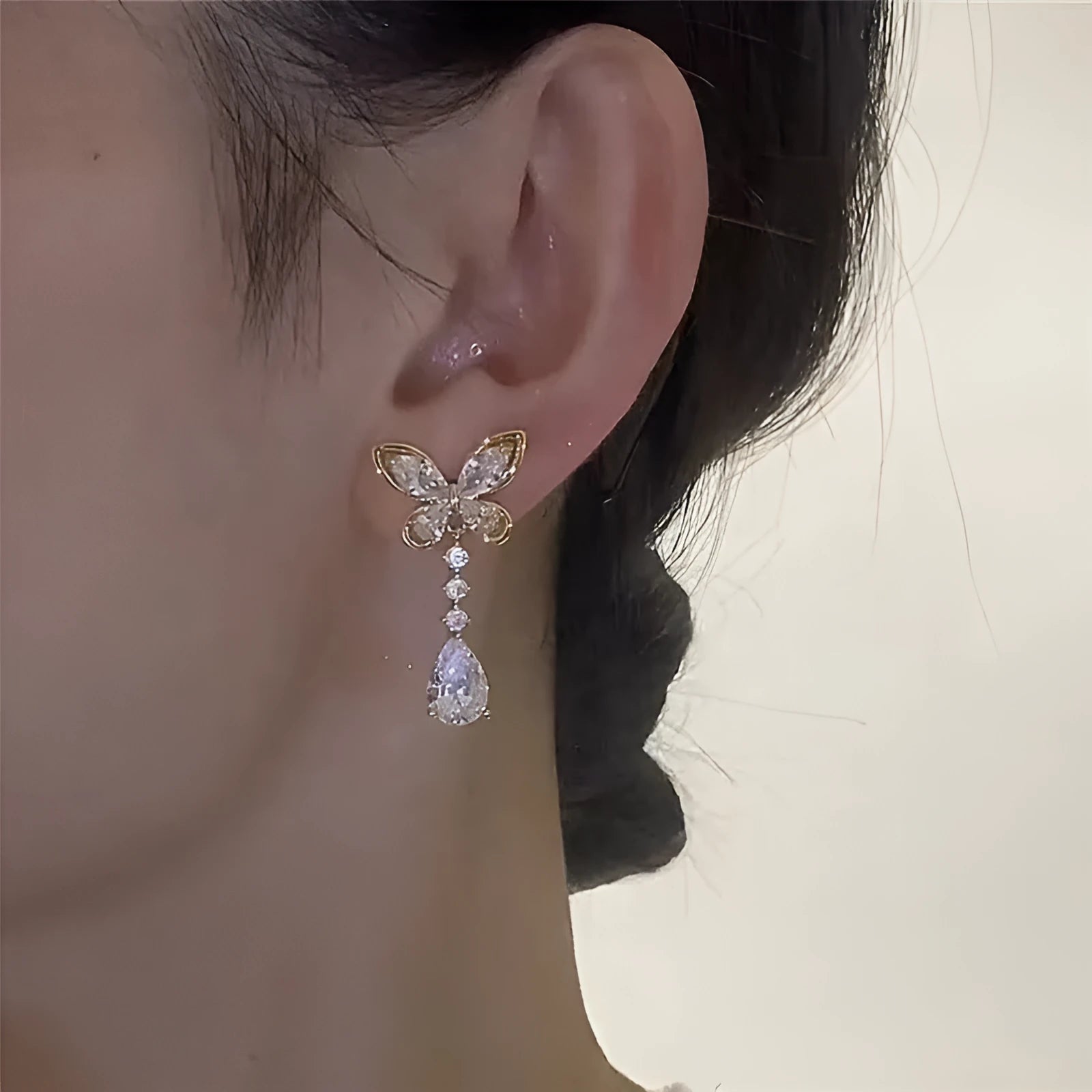 Platinum colour bow stud earrings with electroplated zinc alloy construction