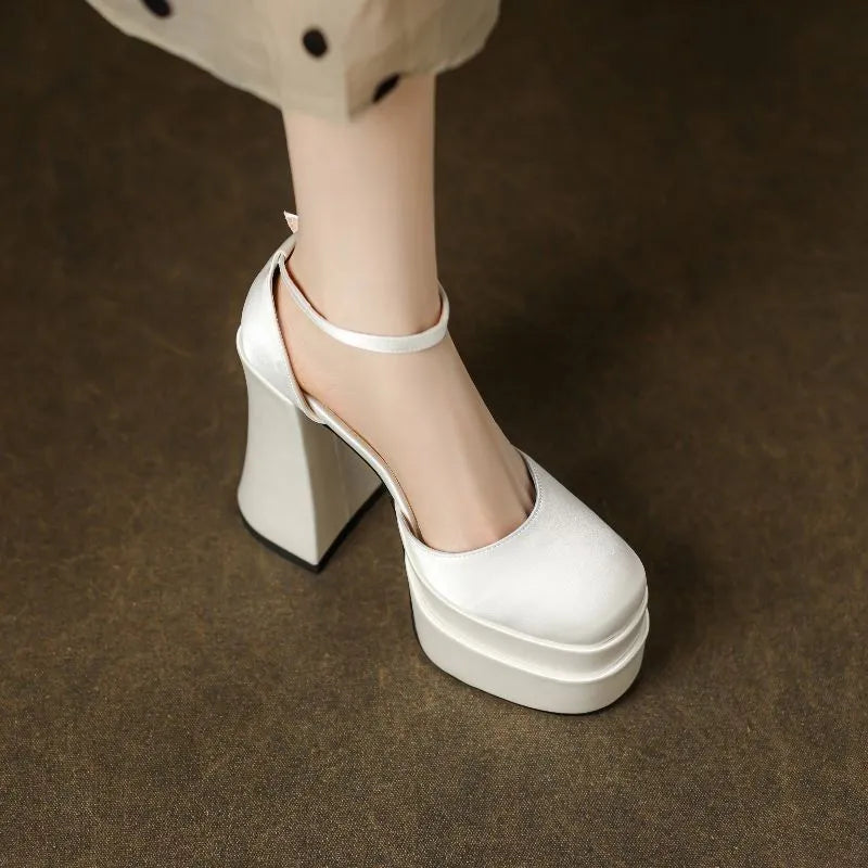 Women's white platform high heels with a chunky heel, round toe, and waterproof PU upper.