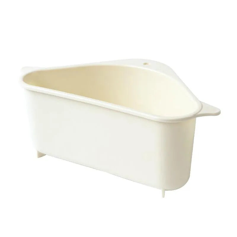Beige plastic triangle sponge drain rack hanging from a kitchen faucet.