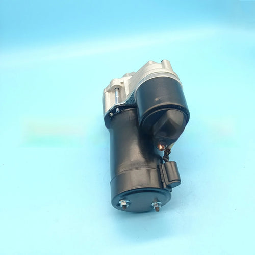 Black automotive starter motor with 10 teeth for Ford Fiesta shown on white background