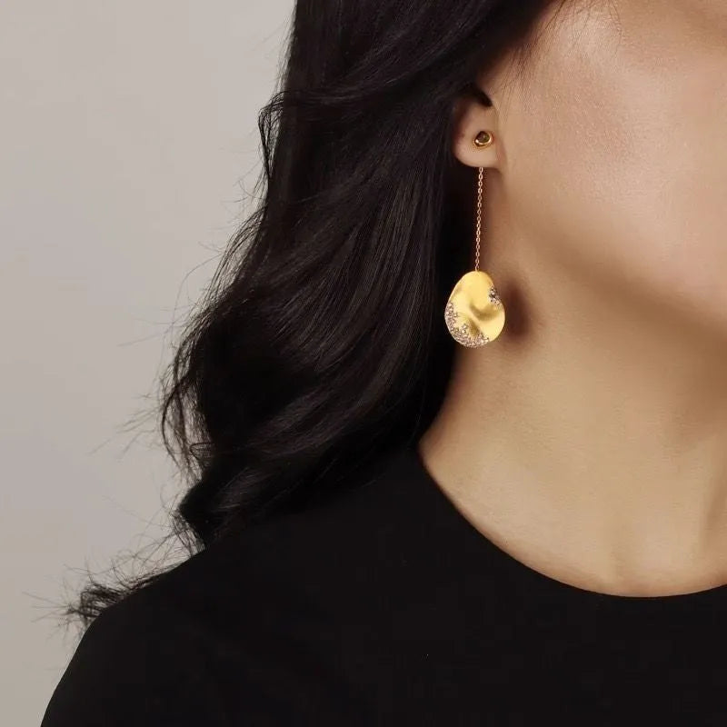Chinese style asymmetrical floral earrings with zircon detailing in gold or silver finish