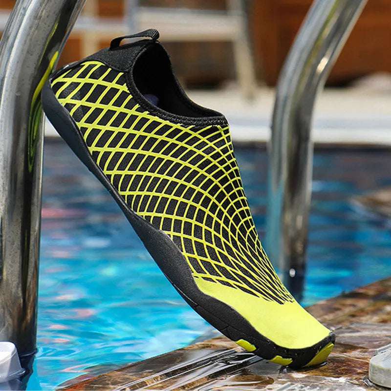 Children's black snorkeling socks and river shoes with natural rubber outsole and mesh upper