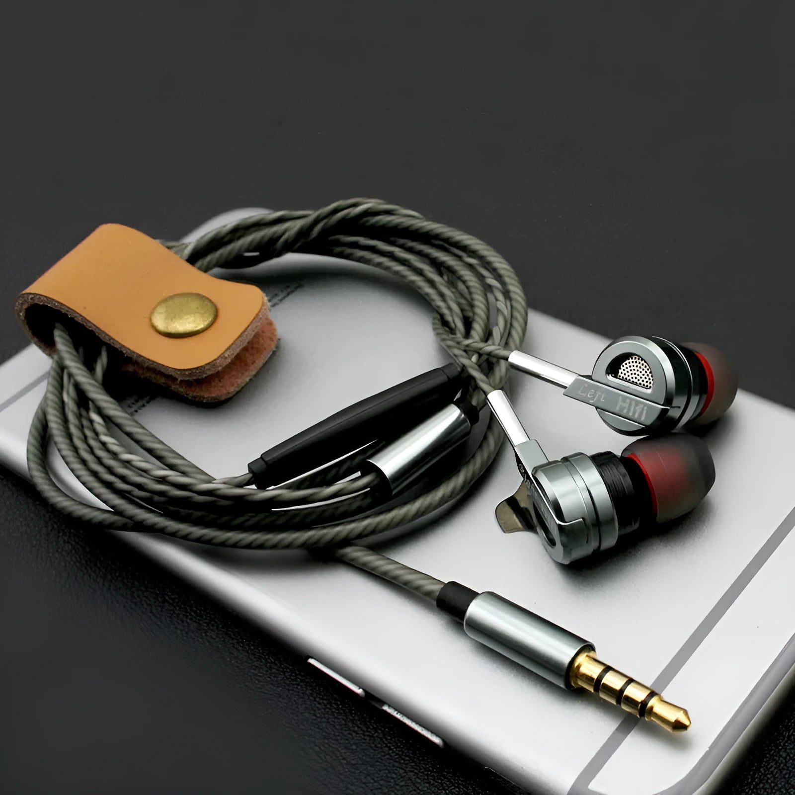Black and silver metal HIFI earphones with wire controls showing double moving coil and dual horn bass design