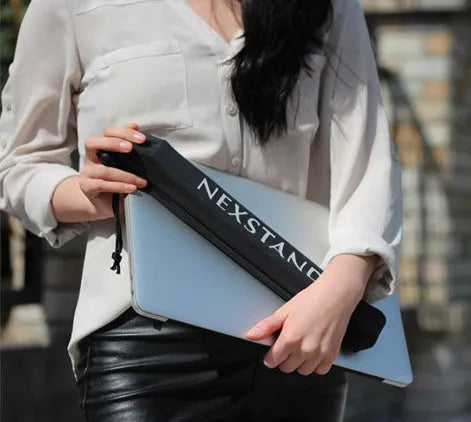 Folding portable laptop stand in black reinforced nylon, front view, compact size for travel
