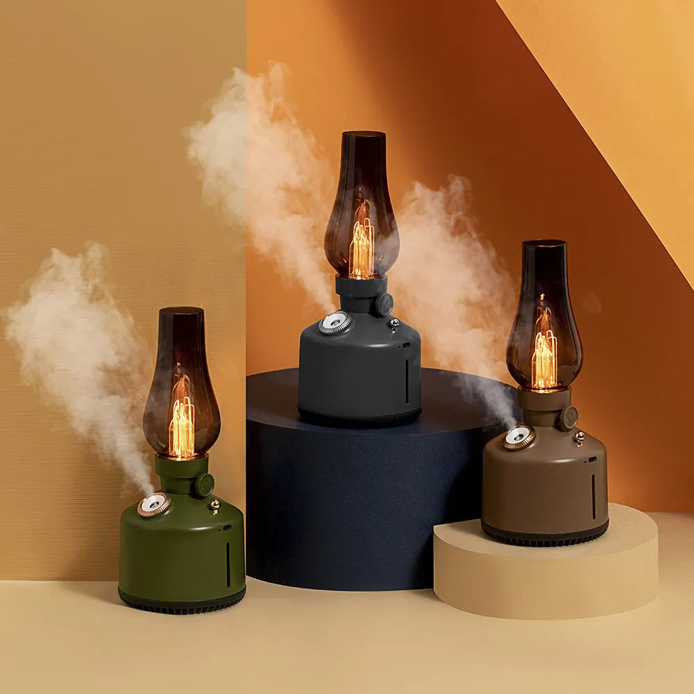 Kerosene lamp ultrasonic humidifier in brass colour with single fog outlet on wooden desk