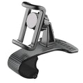 Black adjustable car phone holder with 360-degree rotating head on a car dashboard.