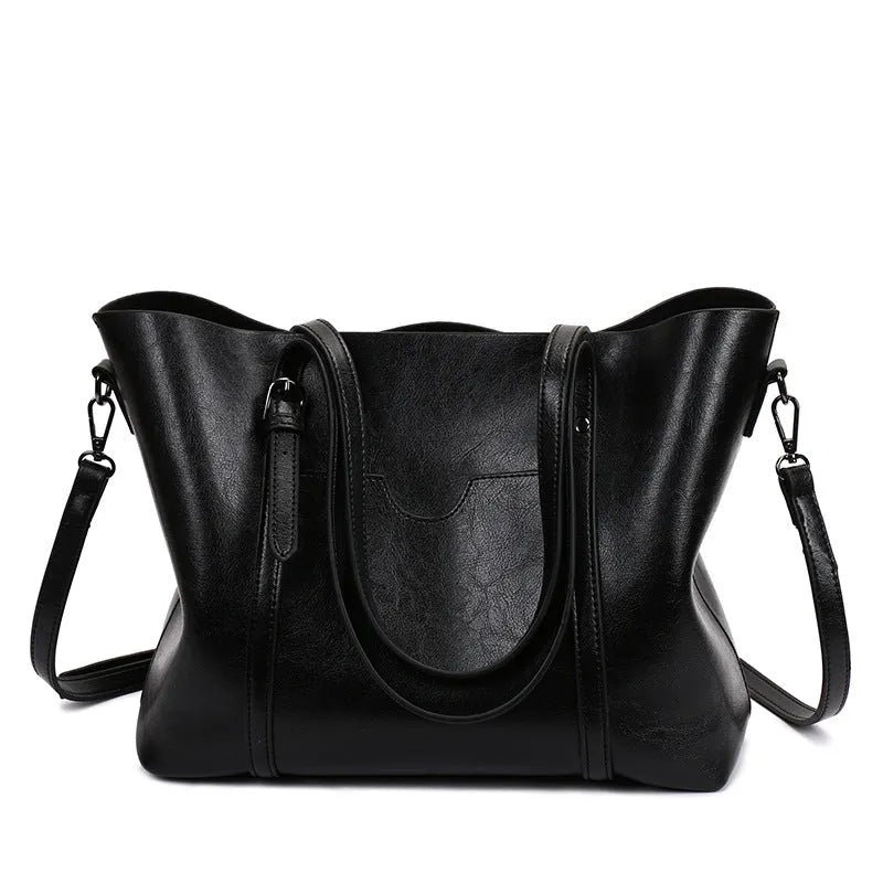 Brown retro-style women's PU leather messenger bag with a top handle and long shoulder strap.