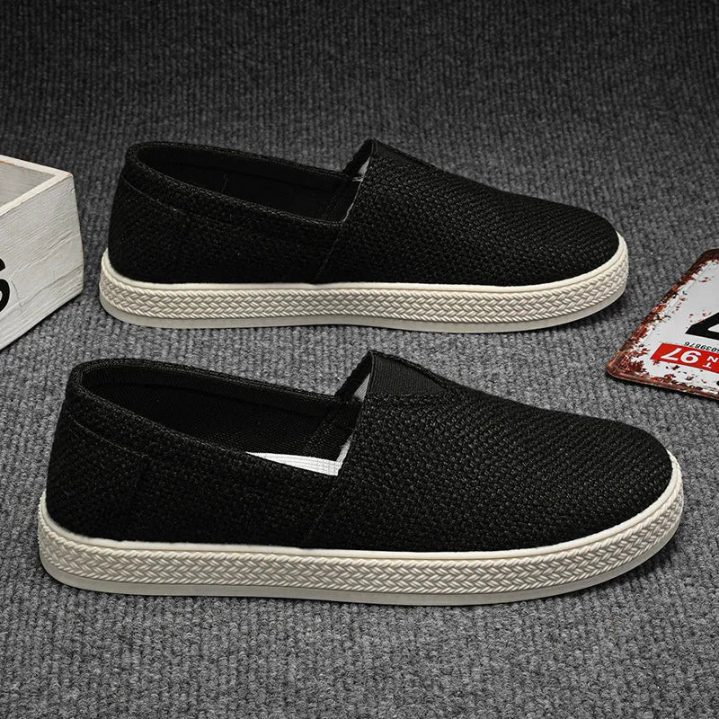 Men's beige linen cloth canvas shoes with round toe and visible stitching on PVC sole