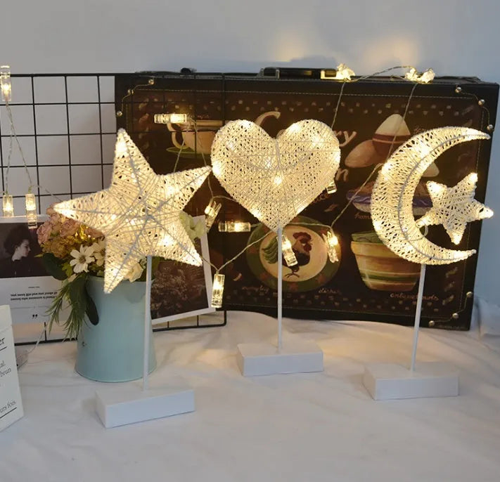 Rattan constructed LED table lamp with star-shaped design and flashing lights for room decoration