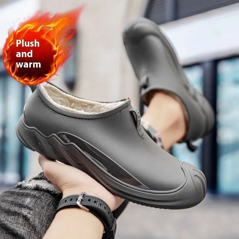 Men's solid colour short rain boots with plastic upper, shown in black, grey, and green.