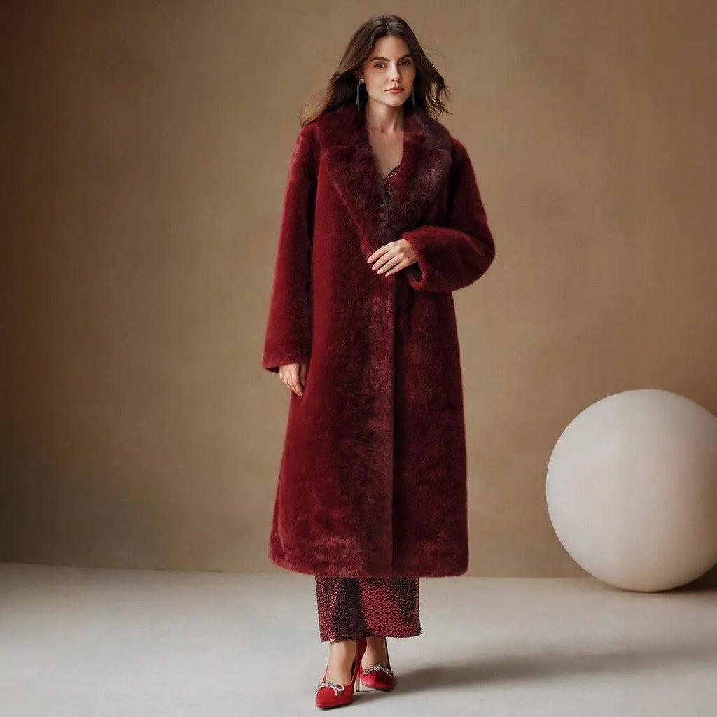 Women's long faux fur coat in camel colour shown from the front.