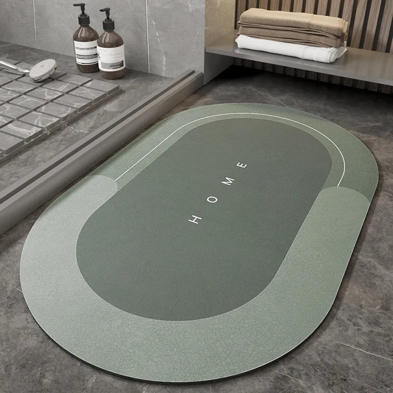 Blended fabric bathroom floor mat in blue, available in oval and rectangular shapes.