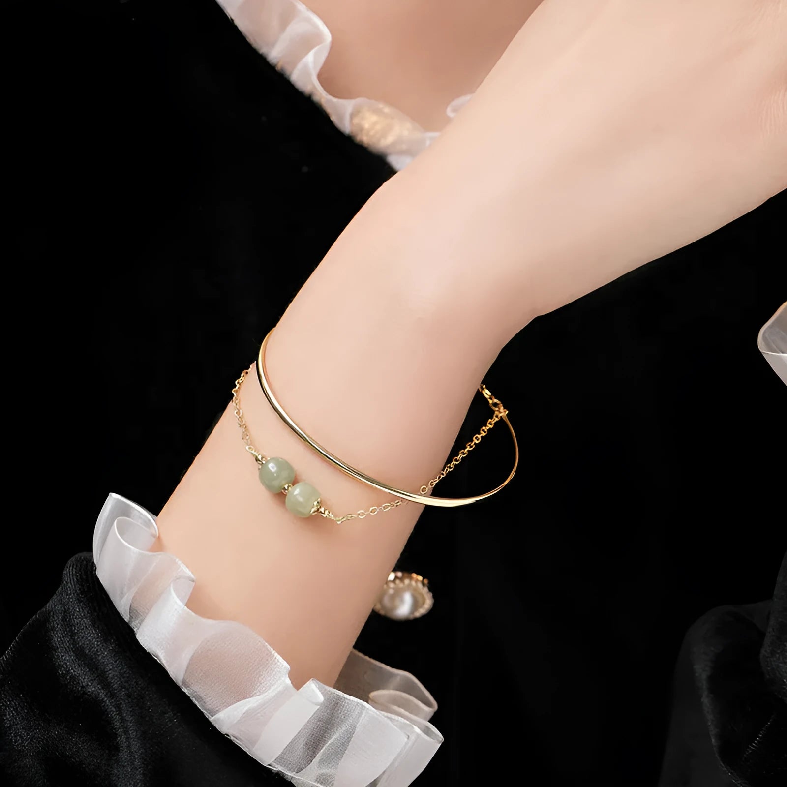 Women's jade lucky beads bracelet with gold inlay treatment in single, double, and three bead styles.