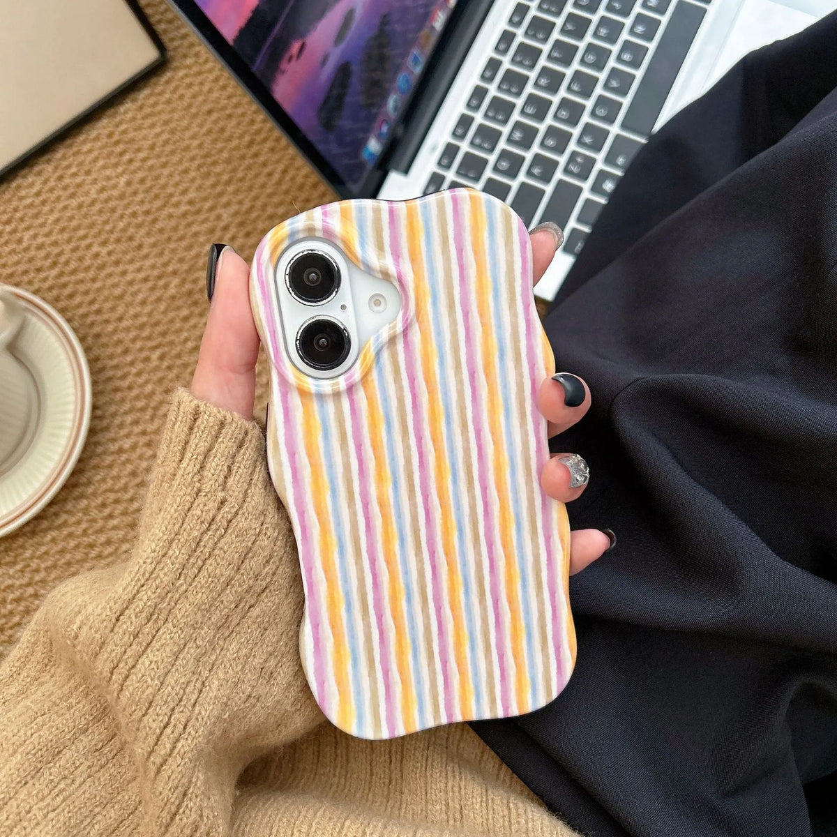 Colour-block striped film phone case showing orange and pink LQ5 wave stripe patterns on iPhone