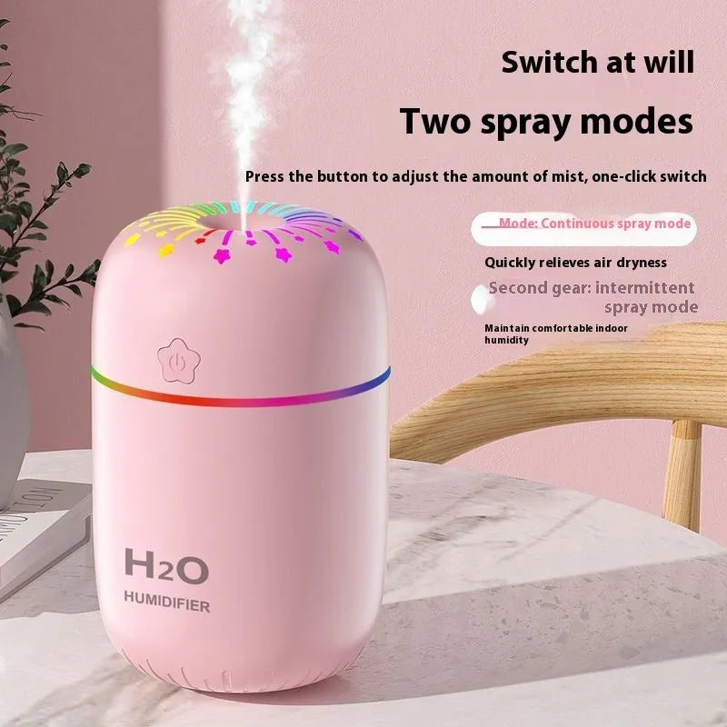 USB mini humidifier with fireworks design in green colour, showing compact 75x75x116mm dimensions