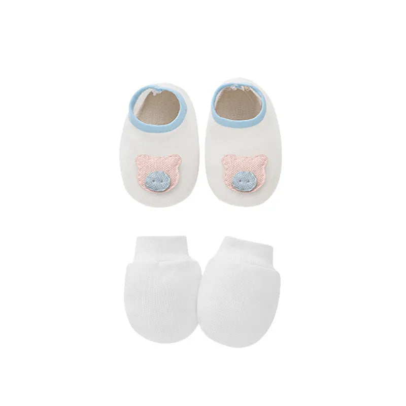 Cotton baby gloves and foot cover set in multiple colours including light blue, navy blue, pink, and camel