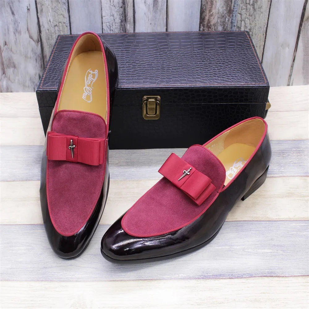 Men's glossy black patent leather low-top shoes with a tassel detail on a white background.