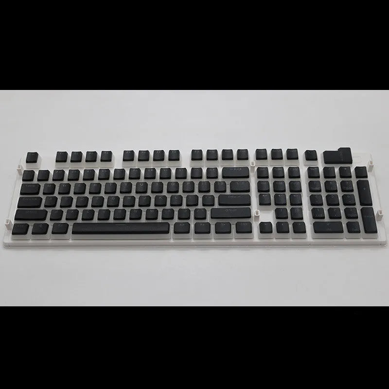 Set of 108 translucent pudding-style PBT keycaps for mechanical keyboards in assorted colours.