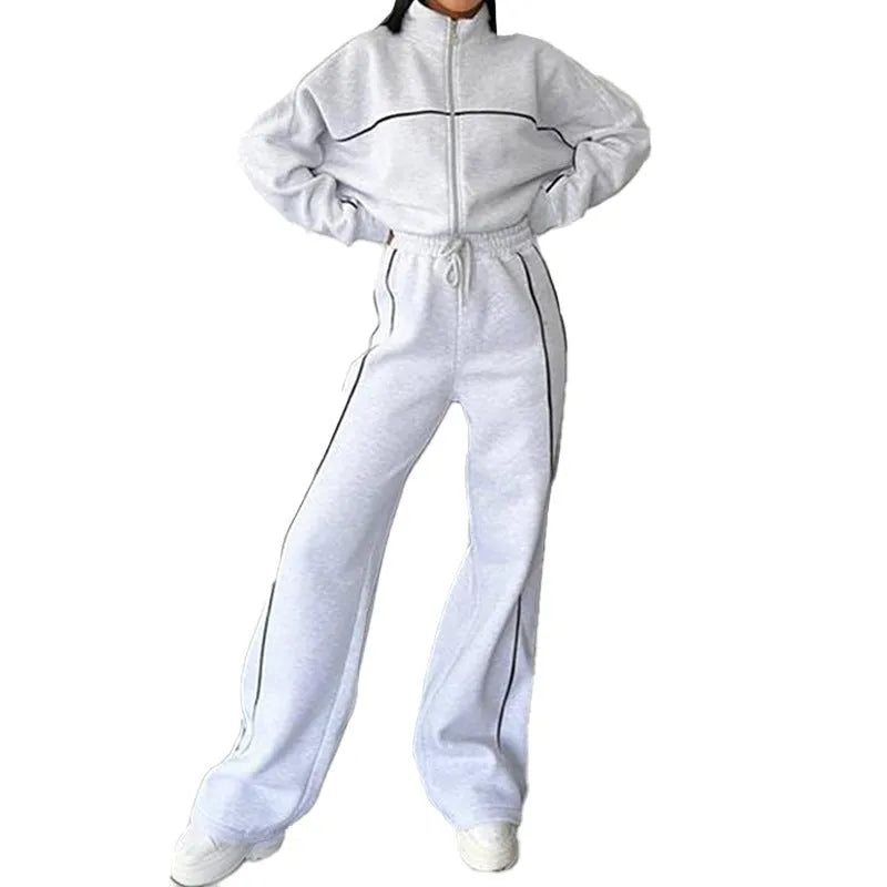 Two-piece striped casual suit with zip-front hoodie and matching trousers in various colours