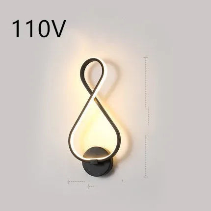 Minimalist Nordic design LED wall lamp with a silicone shade, mounted on a bedroom wall.