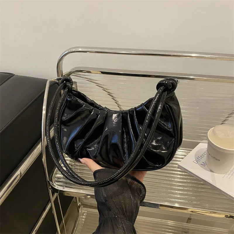Soft black polyester Korean style messenger bag with a horizontal square shape and sandwich pocket.