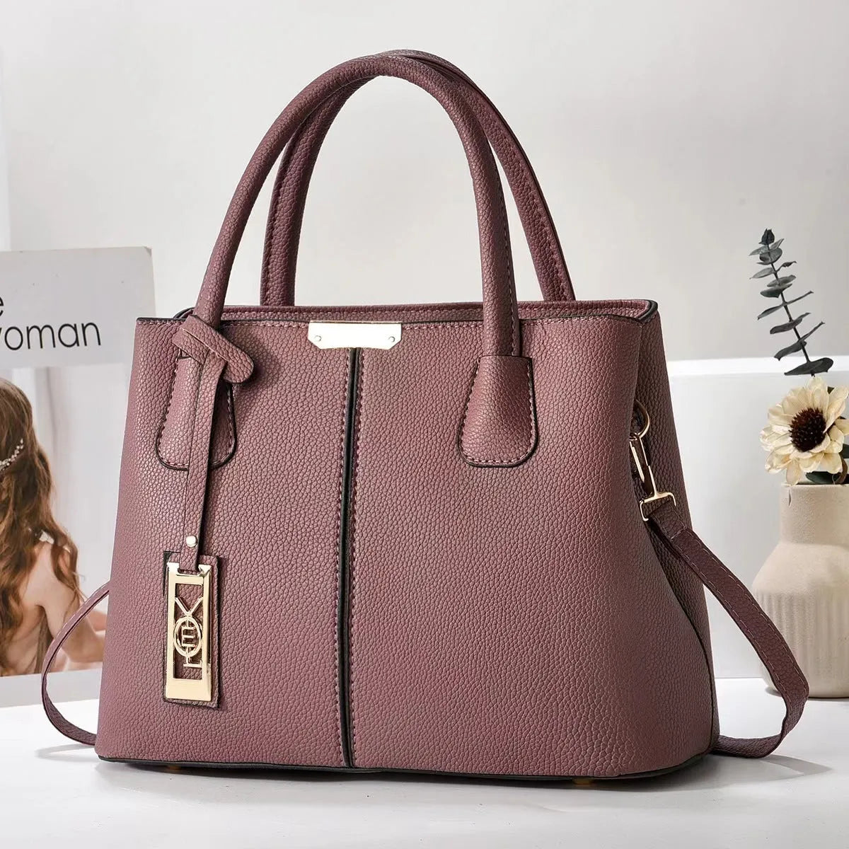 Women's large capacity shoulder bag in soft PU leather with adjustable strap and multiple colour options