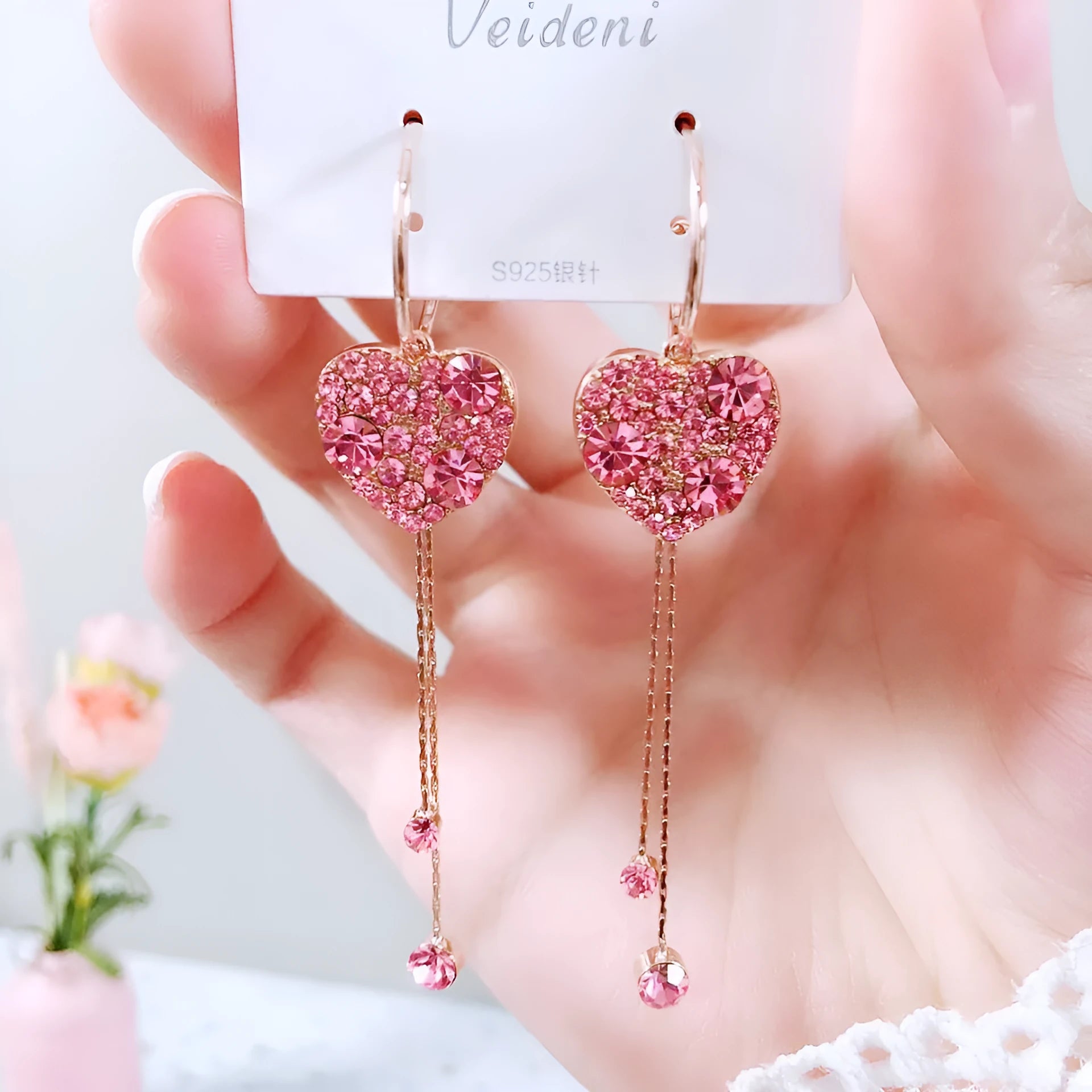 Pink heart shaped tassel earrings with frosty finish on alloy base