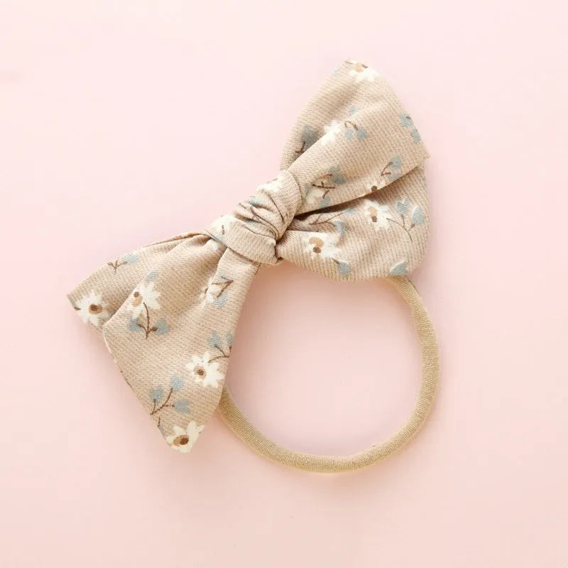 Children's knotted bow hair ring in cloth fabric with Snow White Princess printing