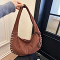Women's soft plush strapless tote handbag in a retro style, shown in one of five available colours.