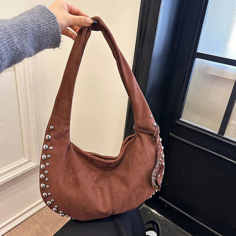 Women's soft plush strapless tote handbag in a retro style, shown in one of five available colours.