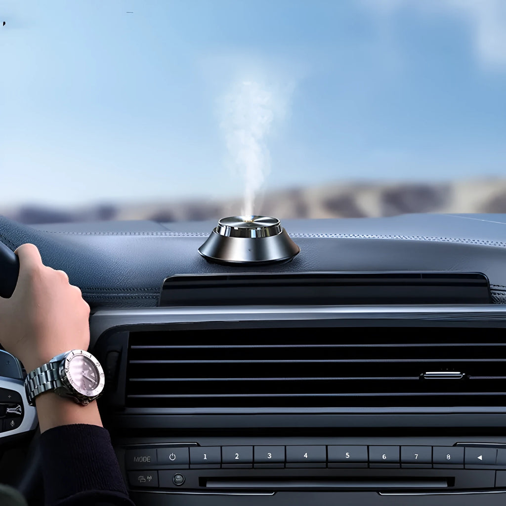 Black metal car perfume diffuser with butterfly design and USB cable for vehicle aromatherapy