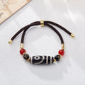 Handmade agate Dzi bead bracelet with 8mm beads in a Tibetan ethnic style.