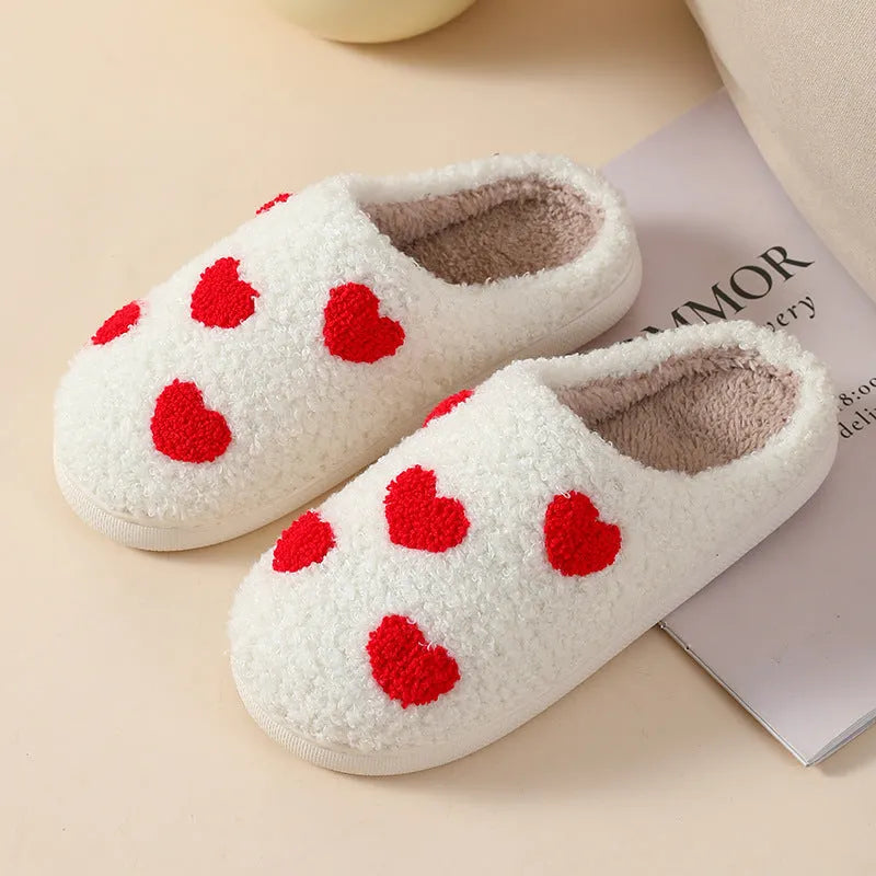 Plush women's cartoon slipper with non-slip PVC sole in Big Love pattern.