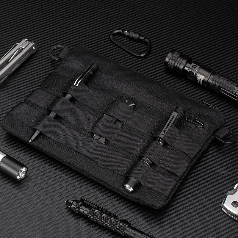 Black Oxford cloth portable outdoor organiser kit measuring 18 by 3.5 centimetres