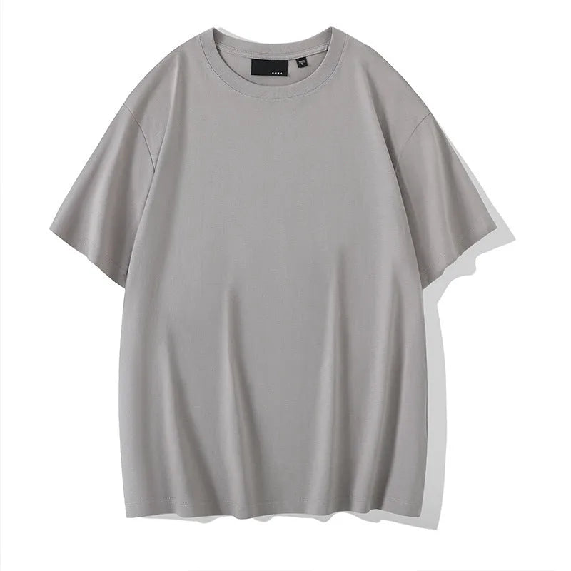 Loose fit men's cotton t-shirt with round neck and drop-shoulder sleeves in solid colour