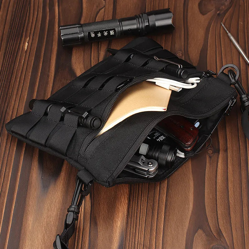 Black Oxford cloth portable outdoor organiser kit measuring 18 by 3.5 centimetres