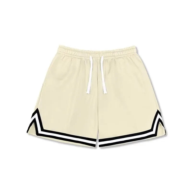 Man wearing loose-fit black polyester sports shorts for summer leisure activities.