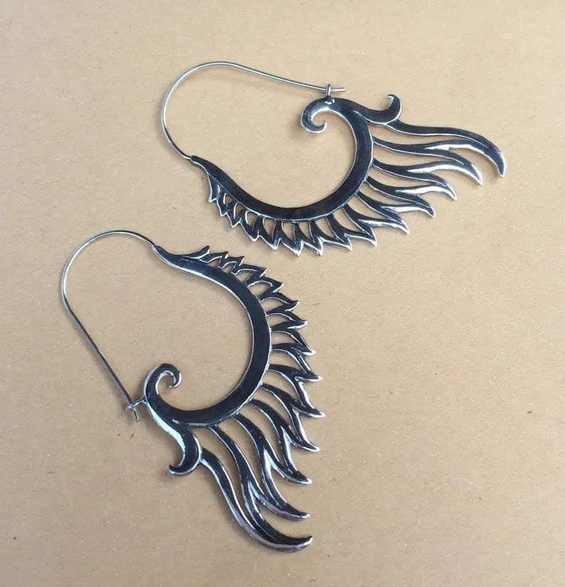 Silver retro creative women's earrings made from electroplated alloy in fashion OL style