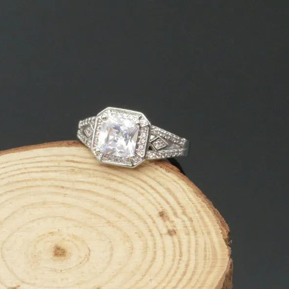 Geometric zircon women's ring with hollow ornament design in platinum colour