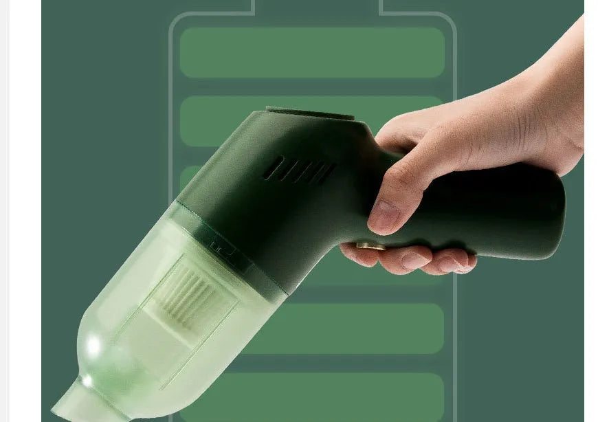 Green electric cat hair cleaner with suction heads for beds